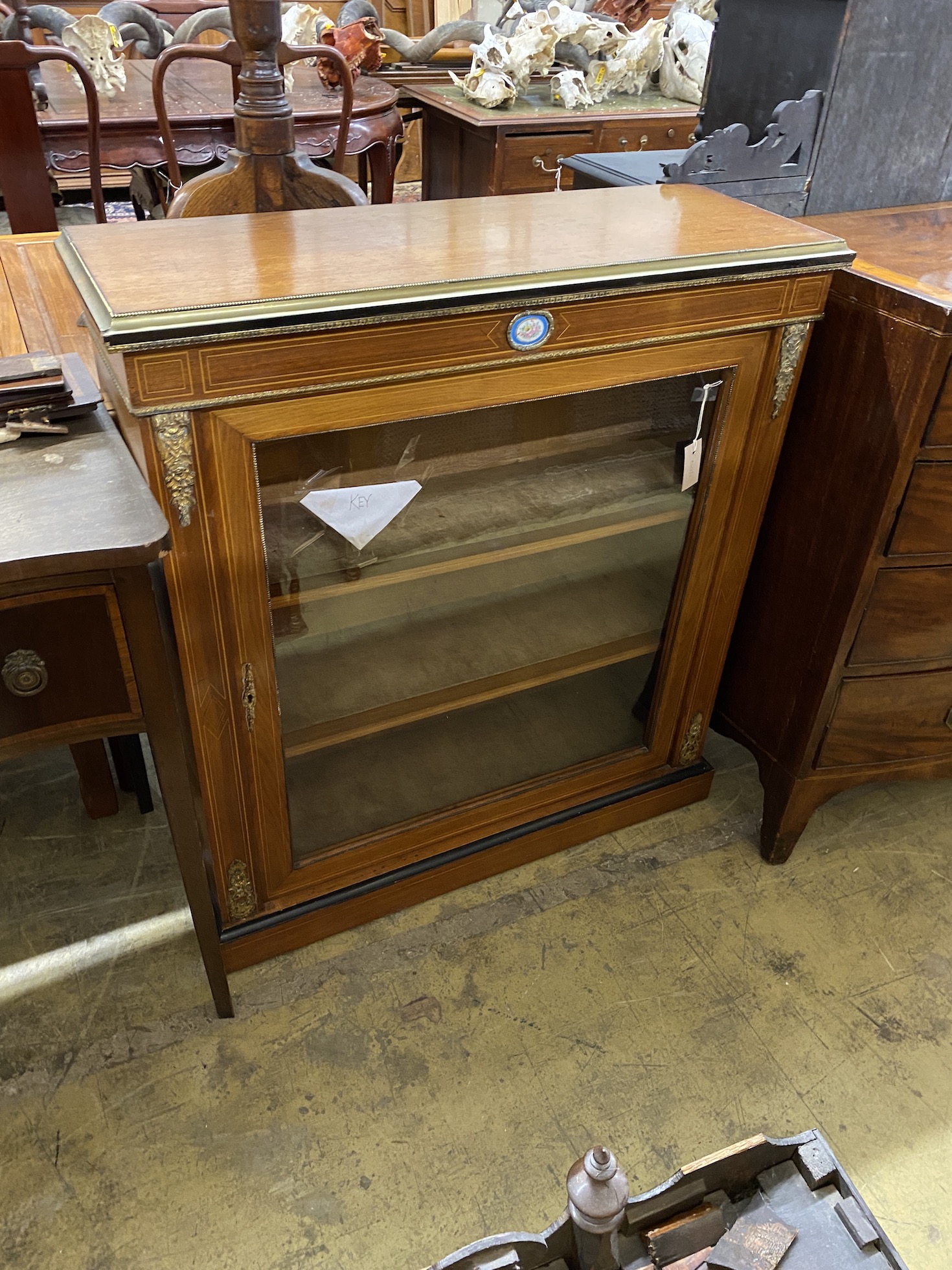 A late 19th century French porcelain and gilt metal mounted pier cabinet, width 92cm, depth 34cm, height 100cm